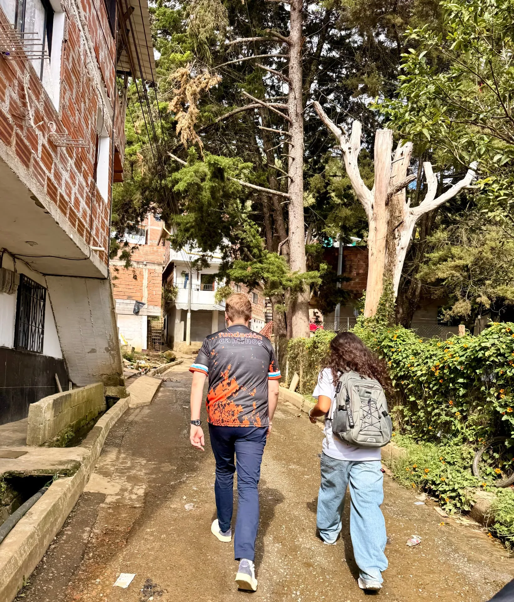 Walking through the neighbourhood streets with a member of the foundation team